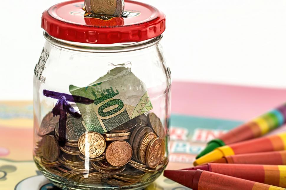 Free Image of piggy bank savings coins cash penny bank money box thrift finance earnings retirement investment pension wealth loose change currency economy financial money save coinage success budget investing hoard fund banking glass collect cent prosperity jar jam jar 