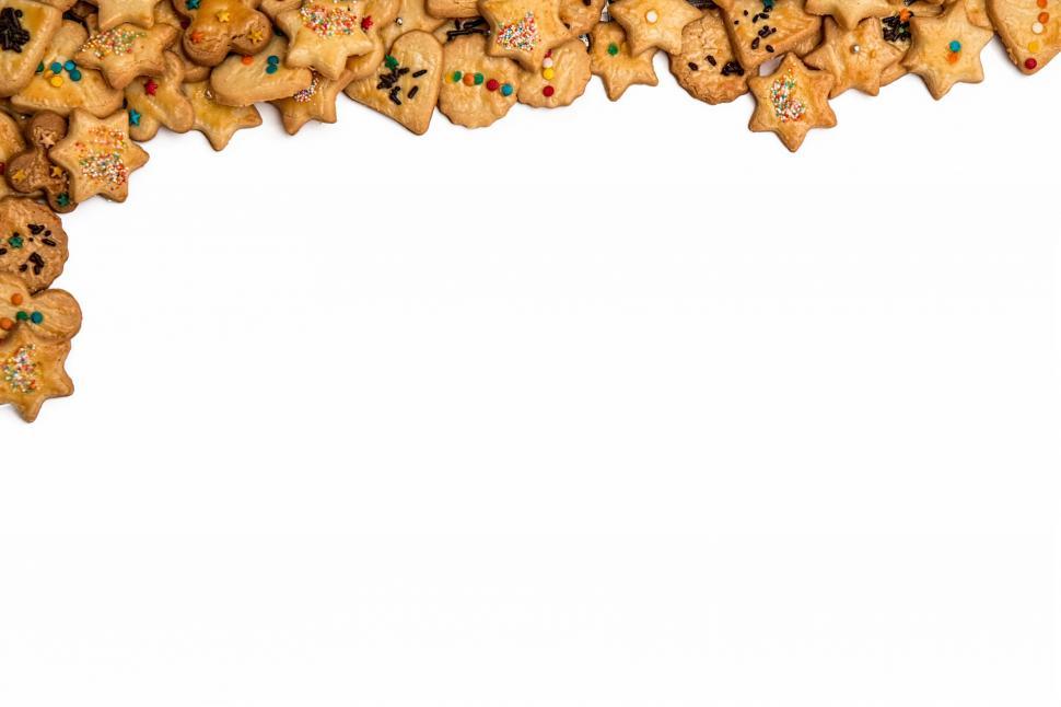 Free Image of A Bunch of Cookies With Sprinkles on a White Background 