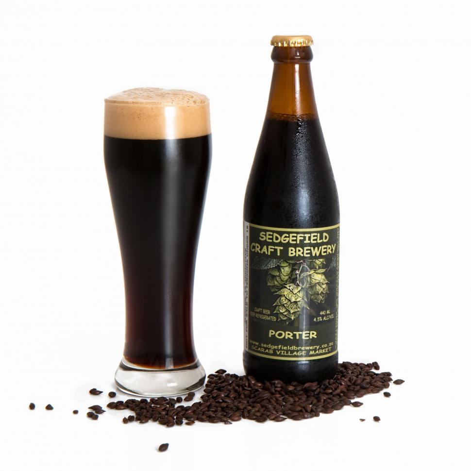 Free Image of craft beer dark beer porter brewery micro brewer refreshing beer pub alcohol bar glass drink beverage malt bottle barley thirsty hop froth thirst quenching ale drinking sedgefield craft brewery 