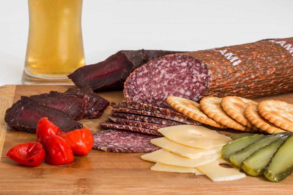 Free Image of Assorted Food on Wooden Cutting Board 