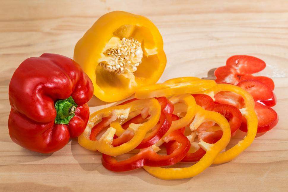 Free Image of Pile of Sliced Red and Yellow Peppers 