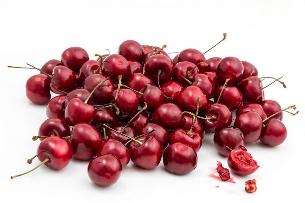 Free Image of Pile of Cherries on White Table 