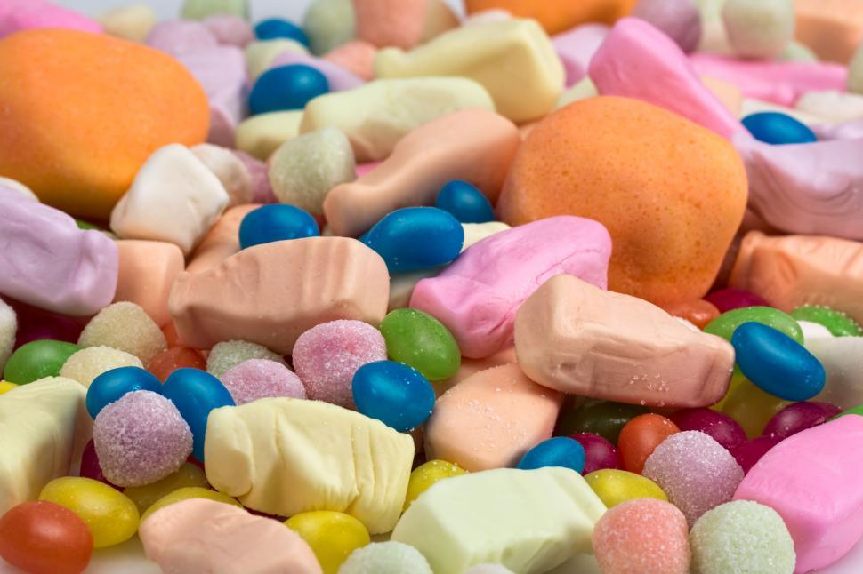 Free Image of Colorful Candies Piled on Table 