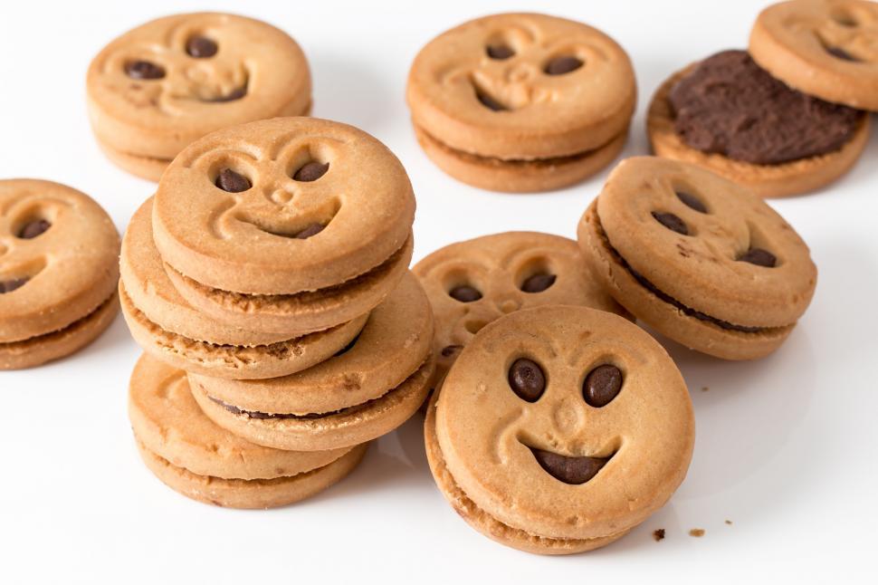 Free Image of cookie biscuit round sweet snack carbohydrate sugar bakery unhealthy baked treat smile jolly jammers tm fattening 