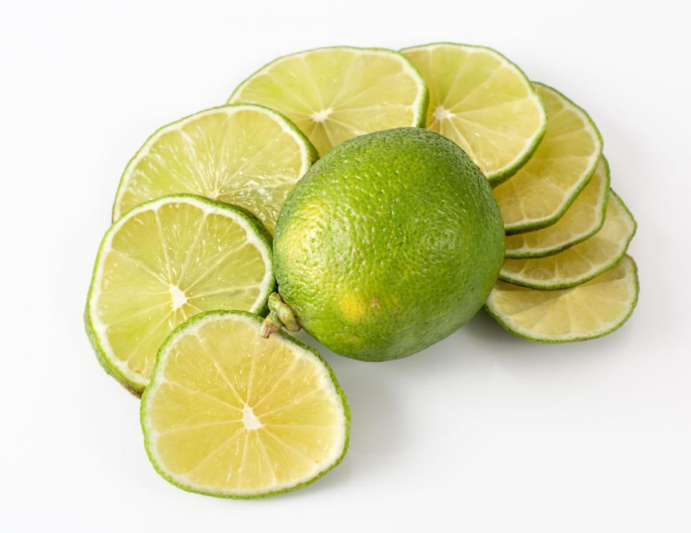 Free Image of A Pile of Limes Stacked 