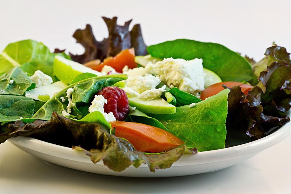 Free Image of Fresh Salad With Lettuce, Raspberries, and Cucumbers 