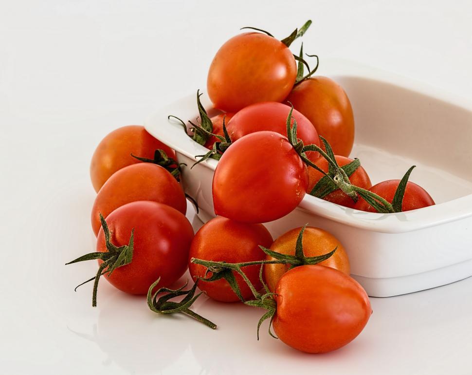 Free Image of White Bowl Filled With Ripe Tomatoes 
