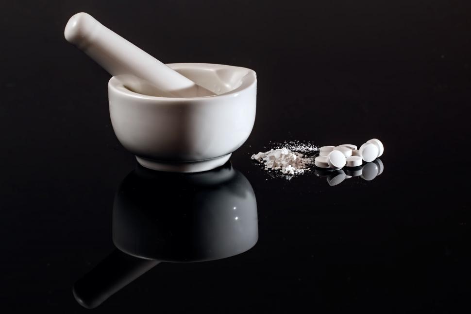Free Image of Mortar and Pills on Table 