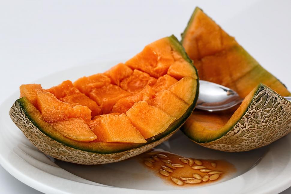 Free Image of White Plate With Halved Melon 