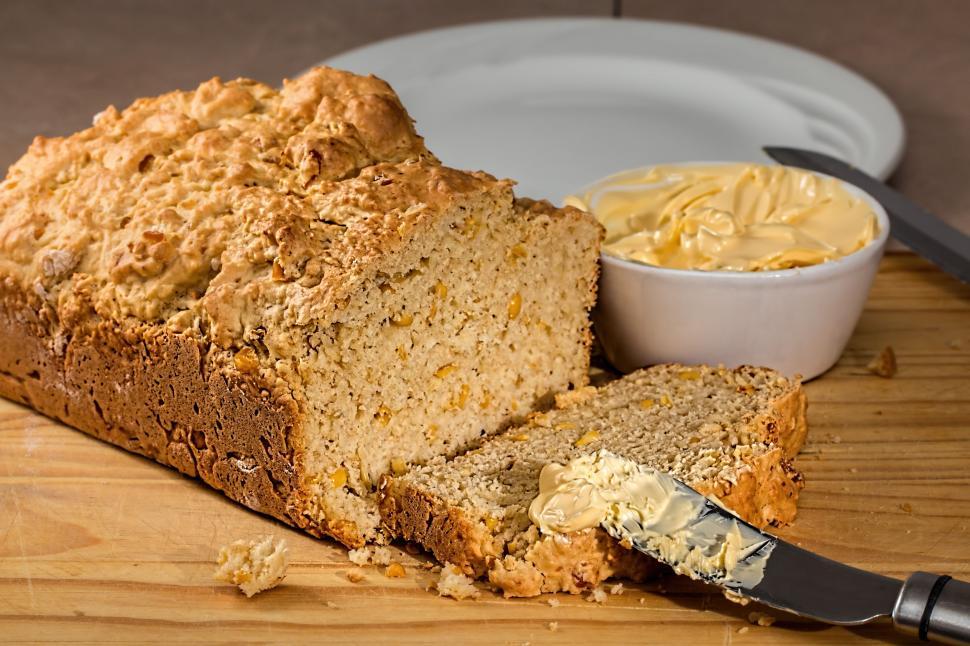 Free Image of corn bread loaf fresh bread maize baked food baking homemade traditional slice crust tasty snack carbohydrate diet nutrition eat protein calorie mealie bread bread and butter 