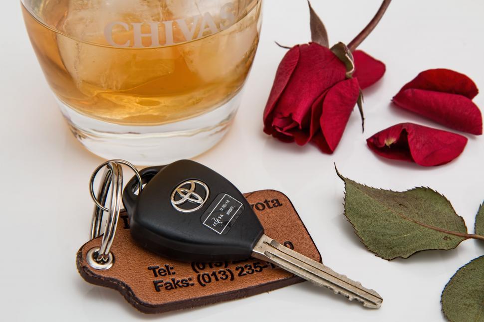 Free Image of Glass of Alcohol and Pair of Keys 