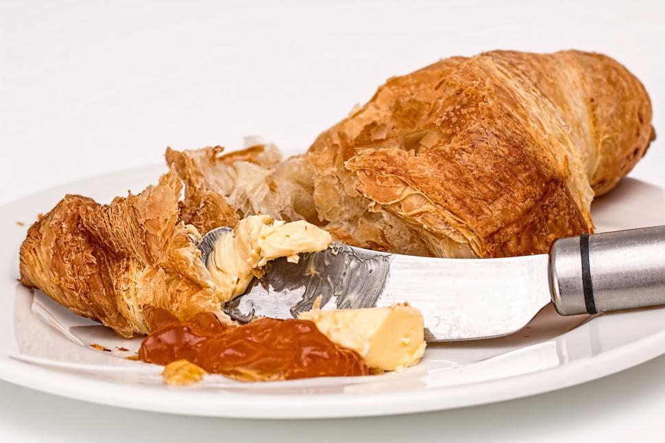 Free Image of croissant pastry jam butter preserve spread bake food snack morning snack delicious cooking eating flaking puff pastry cook tasty pÃ¢tisserie cake sweet french kitchen dough nutrition bakery indulgent indulgence recipe 
