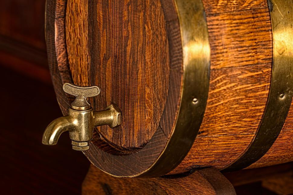 Free Image of beer barrel keg cask oak barrel beer wood wooden cellar pub beverage bar brass tap brass hoops refreshment 