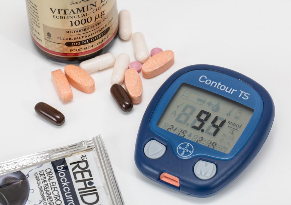 Free Image of Bottle of Vitamins, Pills, and Thermometer on Table 