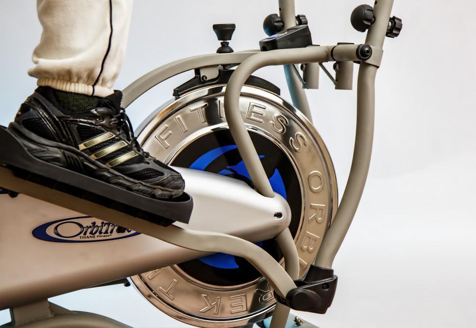 Free Image of Close Up of Person on Stationary Bike 
