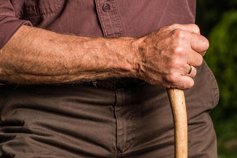 Free Image of hand walking stick arm elderly old person cane retired retirement relaxed content senior pensioner elder grandparent outdoors aged 