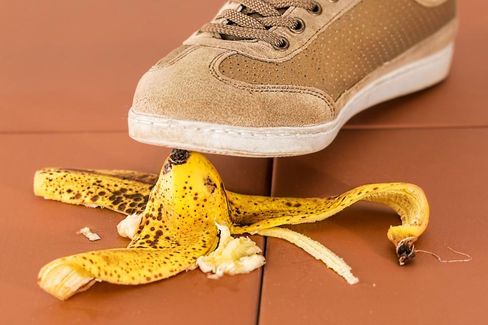 Free Image of slip up danger careless slippery accident risk banana skin hazard peel dangerous foot fall safety injury mistake shoe be careful unexpected tripping misstep take care insurance oops 