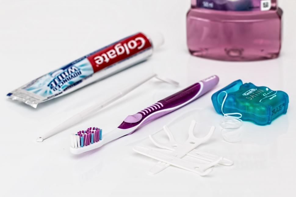 Free Image of Toothbrush, Toothpaste, and Toothpaste Tube on Table 