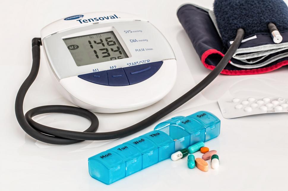 Free Image of Medical Supplies Including Thermometer, Pills, and Hat 