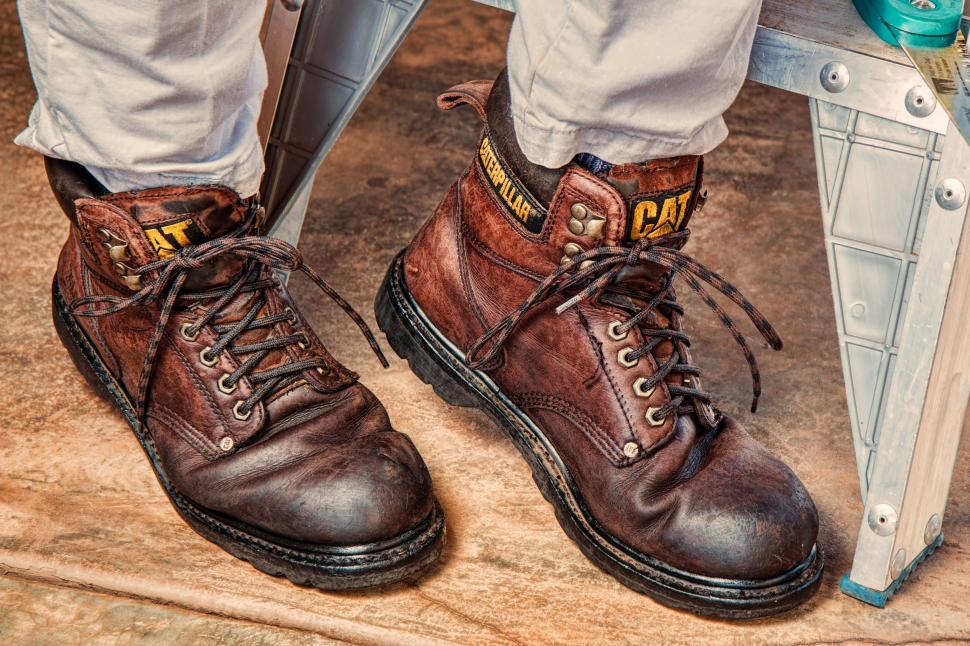 Free Image of work boots footwear protection leather safety boot work brown rough old laces protective construction heavy pair foot comfort feet worker artisan labourer worn occupation comfortable hardworking job caterpillar 