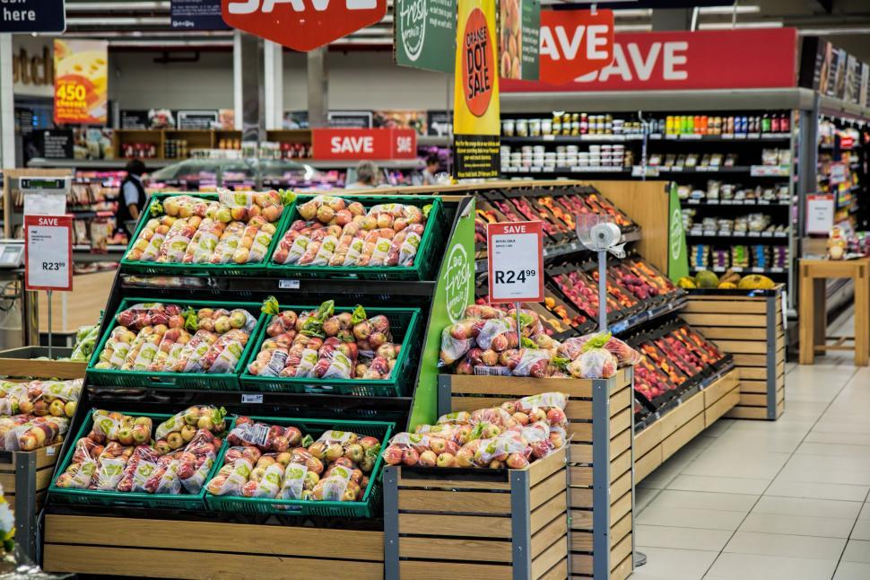 Free Image of shopping supermarket merchandising store shop food market retail buy grocery commerce grocery store grocery shopping purchase products consumer consumerism shelves produce marketing business branding commercial 