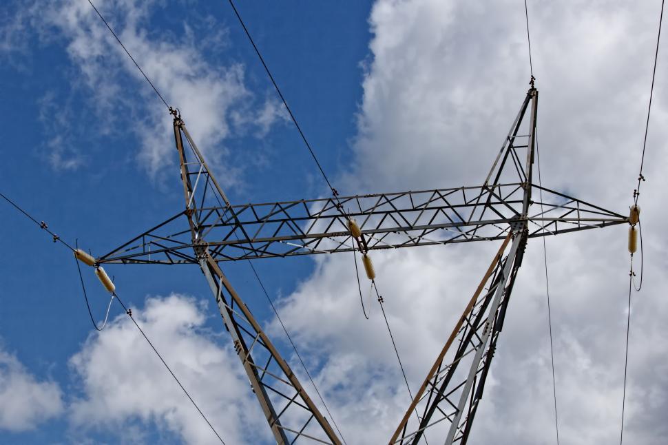 Free Image of High Voltage Power Line Under Cloudy Blue Sky 