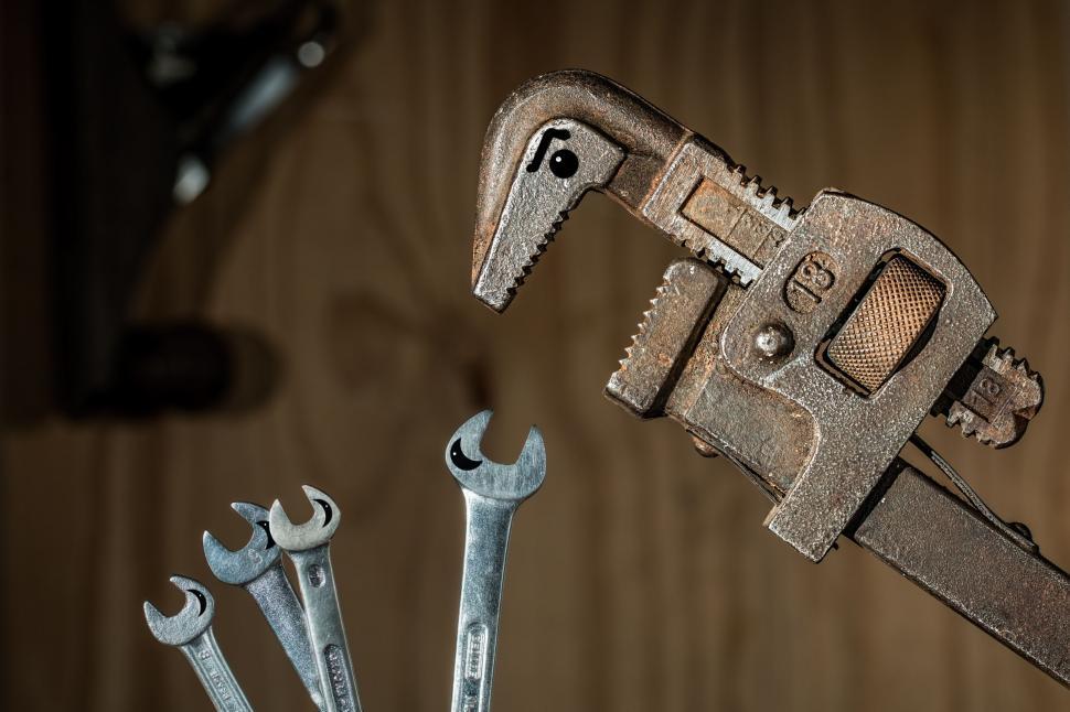 Free Image of Assorted Wrenches on Wooden Table 