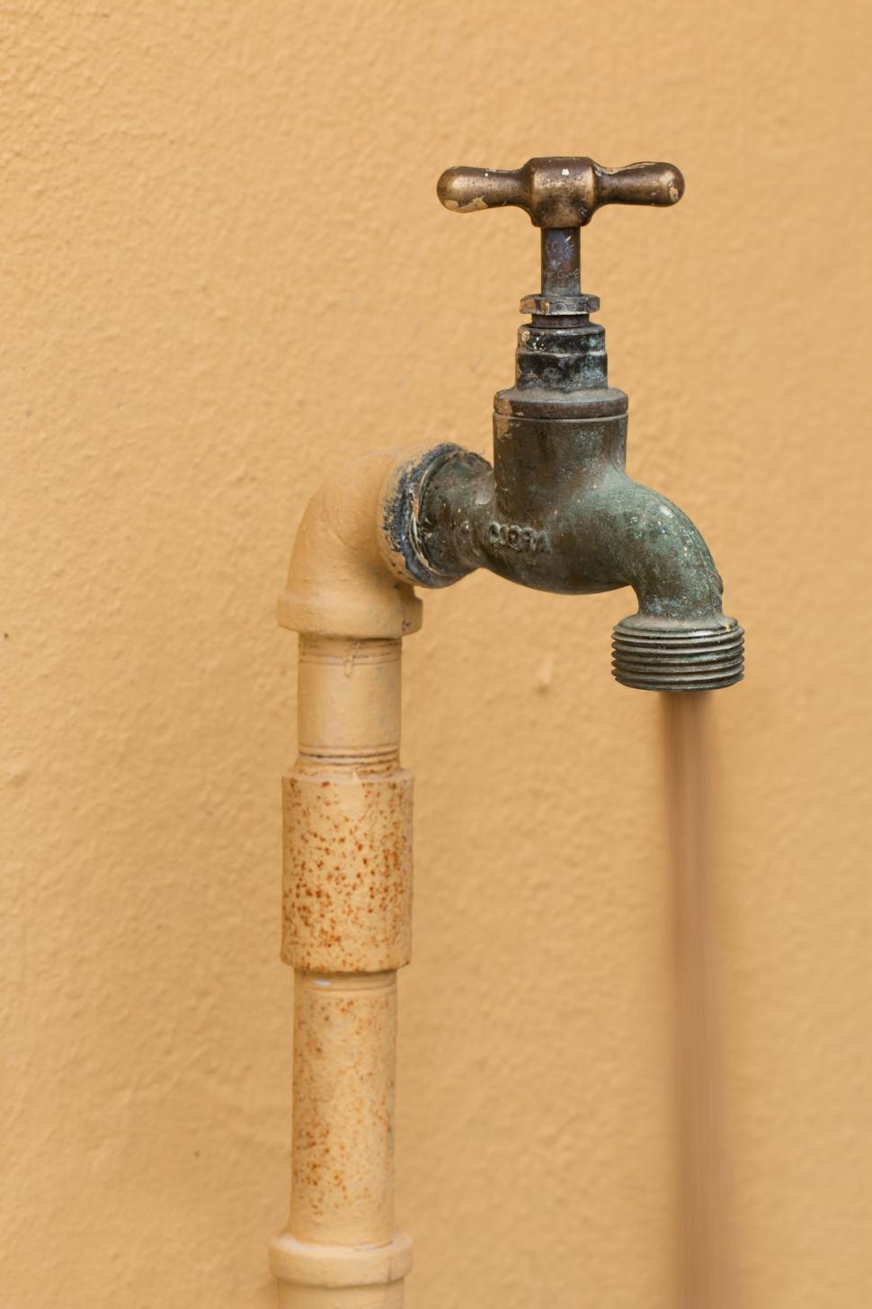 Free Image of faucet plumbing tap plumber pipe sanitary repairman water dry drought mistake fault repair service maintenance handyman fix technician tool fixing broken dirty water water purification polluted water pollution water quality defect failure global warming 