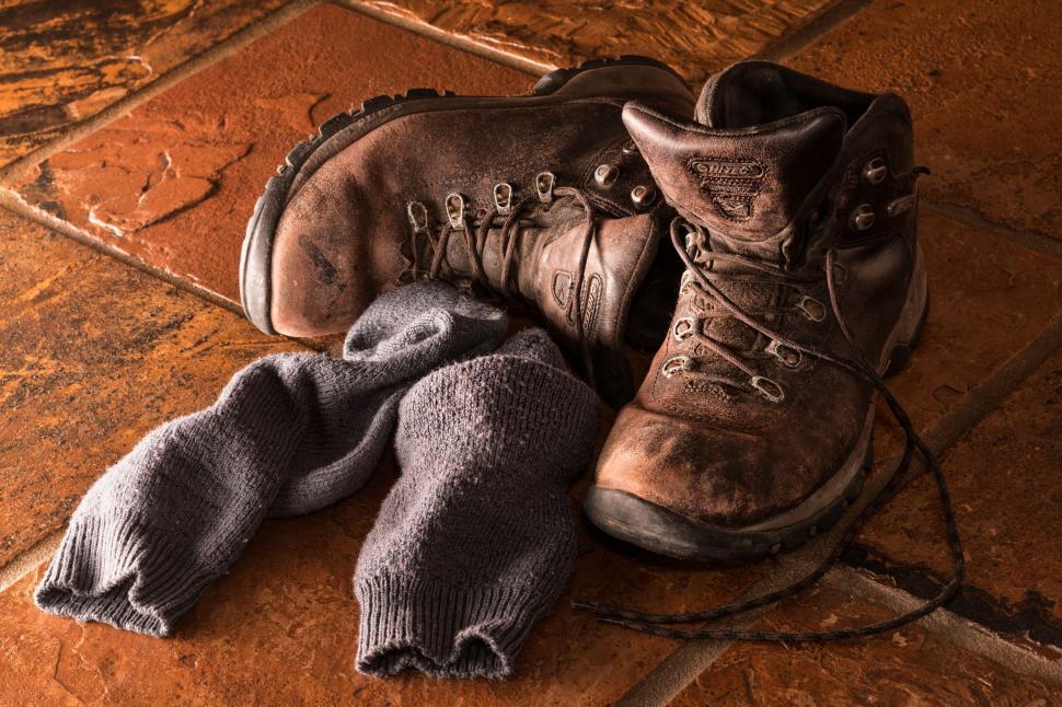 Free Image of boots footwear workwear socks shoes leather pair work tired worn out laces protective clothing walking shoes hiking boots weary end of day 