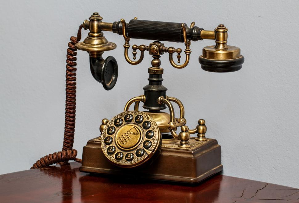 Free Image of Vintage Telephone on Wooden Table 