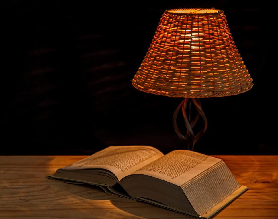 Free Image of light lamp bedside lamp illumination lampshade illuminate book reading literature study knowledge wisdom reading lamp open book 