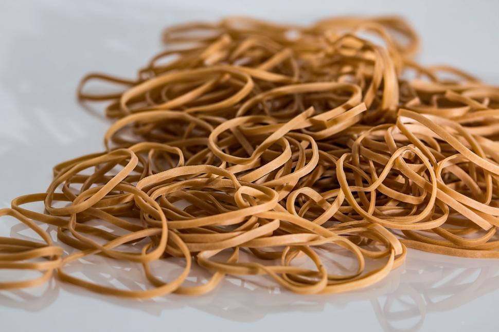 Free Image of A Pile of Rubber Bands on a Table 