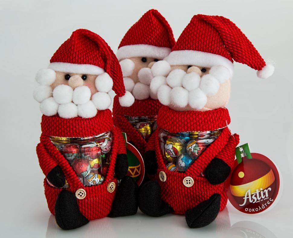 Free Image of Two Stuffed Santas Sitting Together 