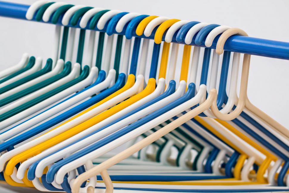 Free Image of Row of Clothes Hangers Sitting Neatly 
