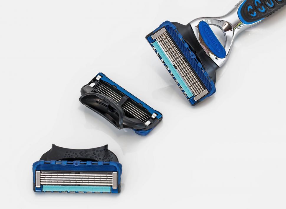 Free Image of Close Up of a Razor and a Comb 