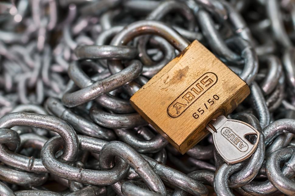 Free Image of Padlock on Chain With Additional Padlock 
