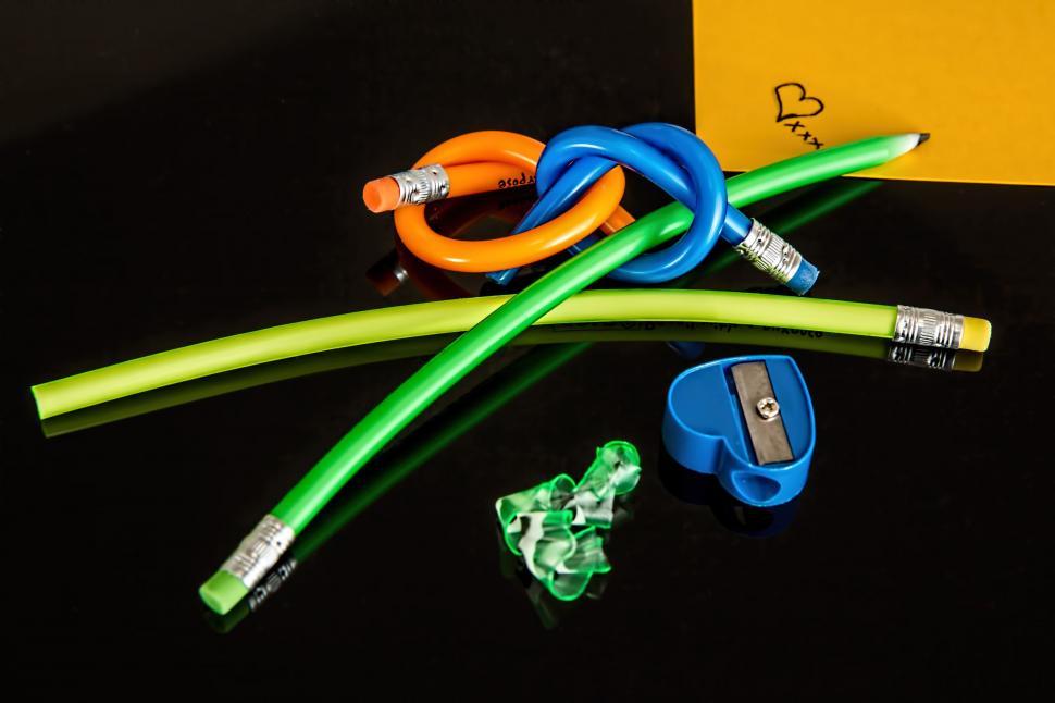 Free Image of Group of Different Colored Wires on Black Surface 