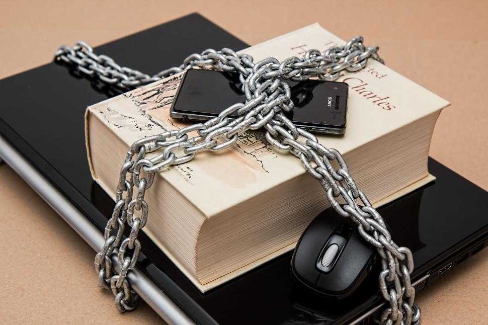 Free Image of Stack of Books With Computer Mouse 