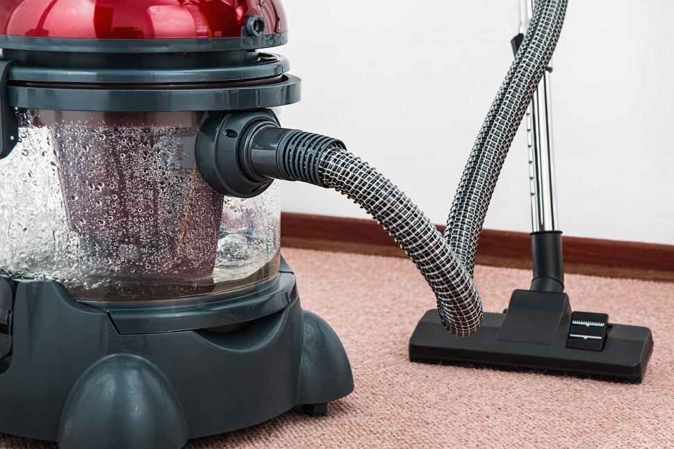 Free Image of Close Up of a Vacuum on a Carpet 
