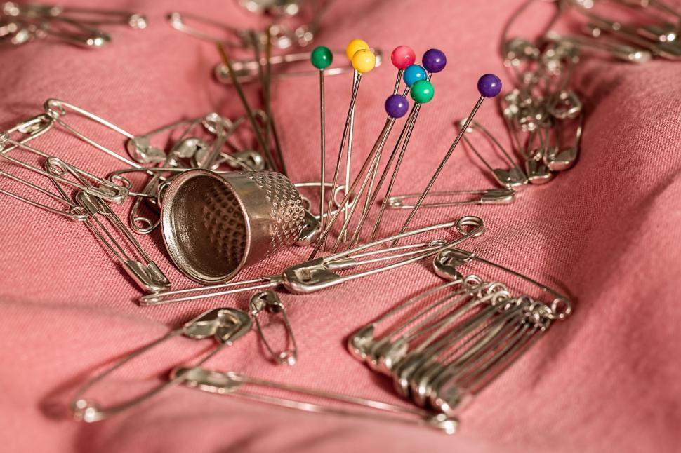 Free Image of sewing thimble pins safety pins needle mending repair haberdashery prick 