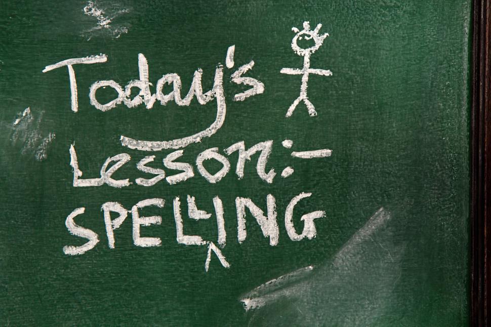 Free Image of Spelling Lesson Text on Chalkboard in classroom  