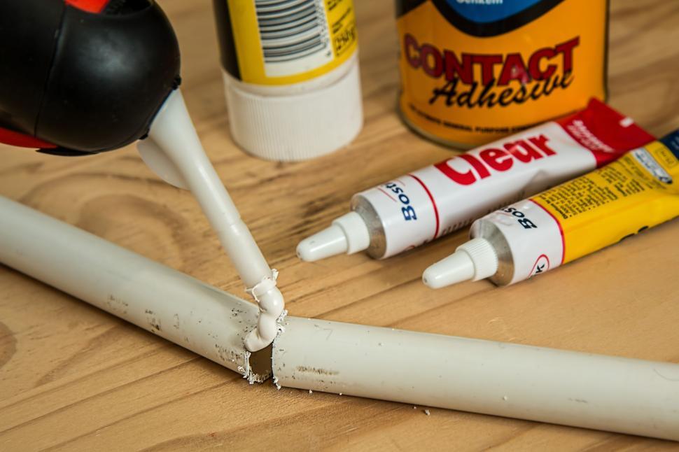 Free Image of Repairing plastic pipe with adhesive  