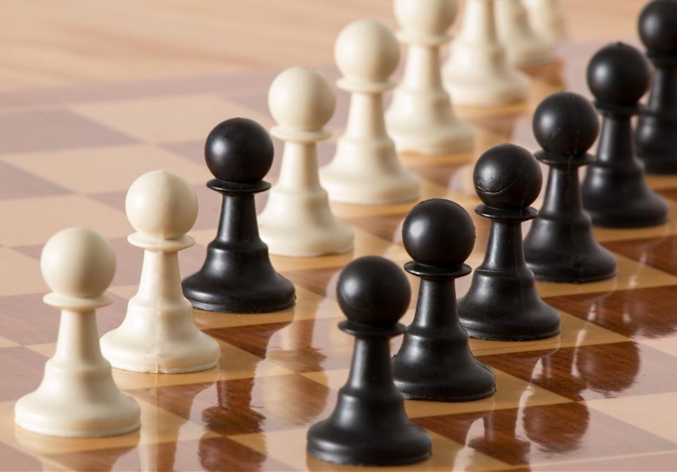 Free Image of Close-Up of Chess Board With Black and White Pieces 