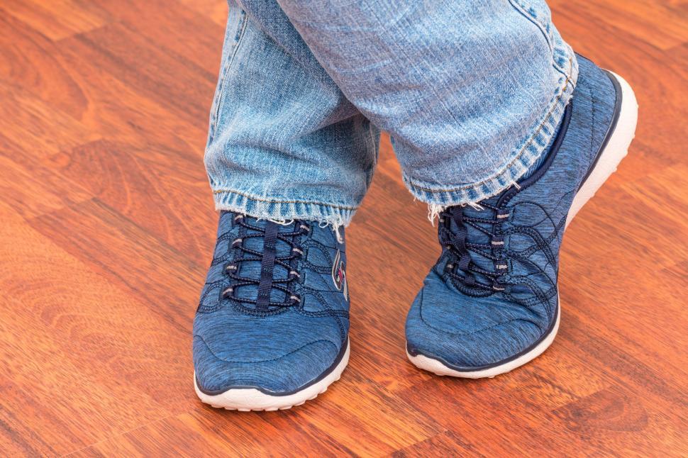 Free Image of Person Standing on Hardwood Floor 