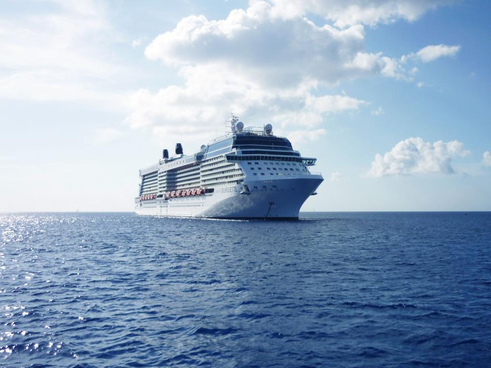 Free Image of Large Cruise Ship Sailing in the Middle of the Ocean 