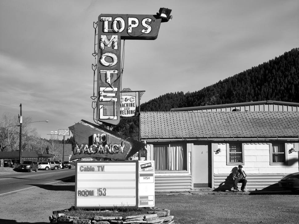 Free Image of Neon Sign Letters of TOPS Motel  