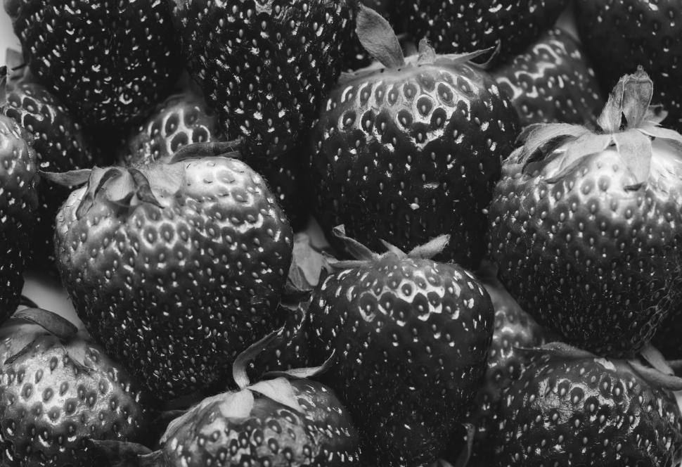 Free Image of Dark black and white close up of strawberries 