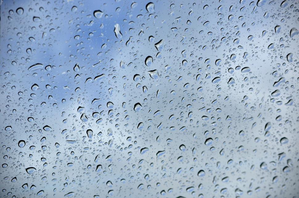 Download Free Stock Photo of Rain on window blue sky 