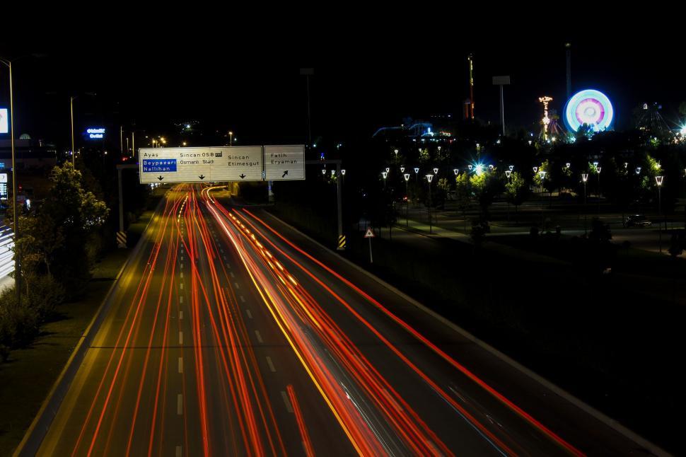 Free Image of Colorful light trails on road  