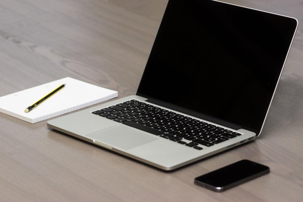 Free Image of Office Table with Laptop and Phone  